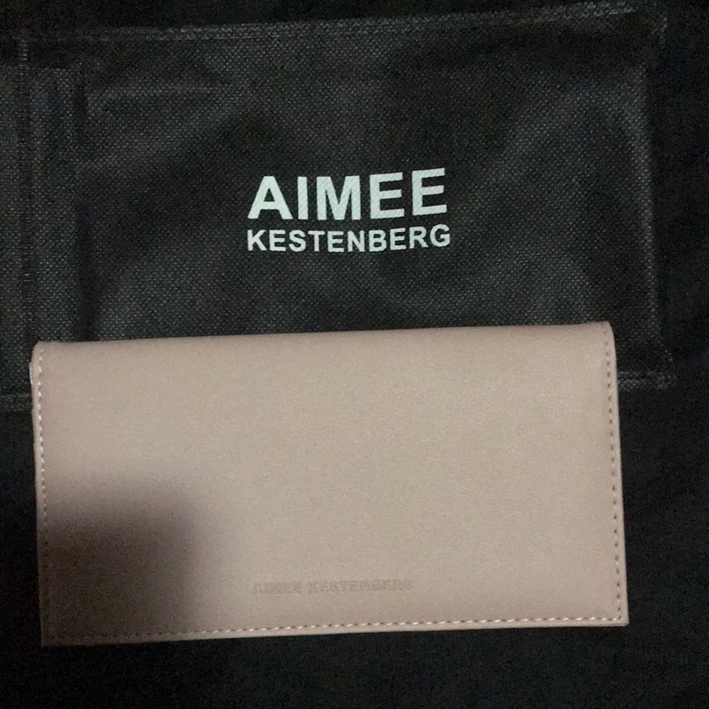Light pink wallet with bag